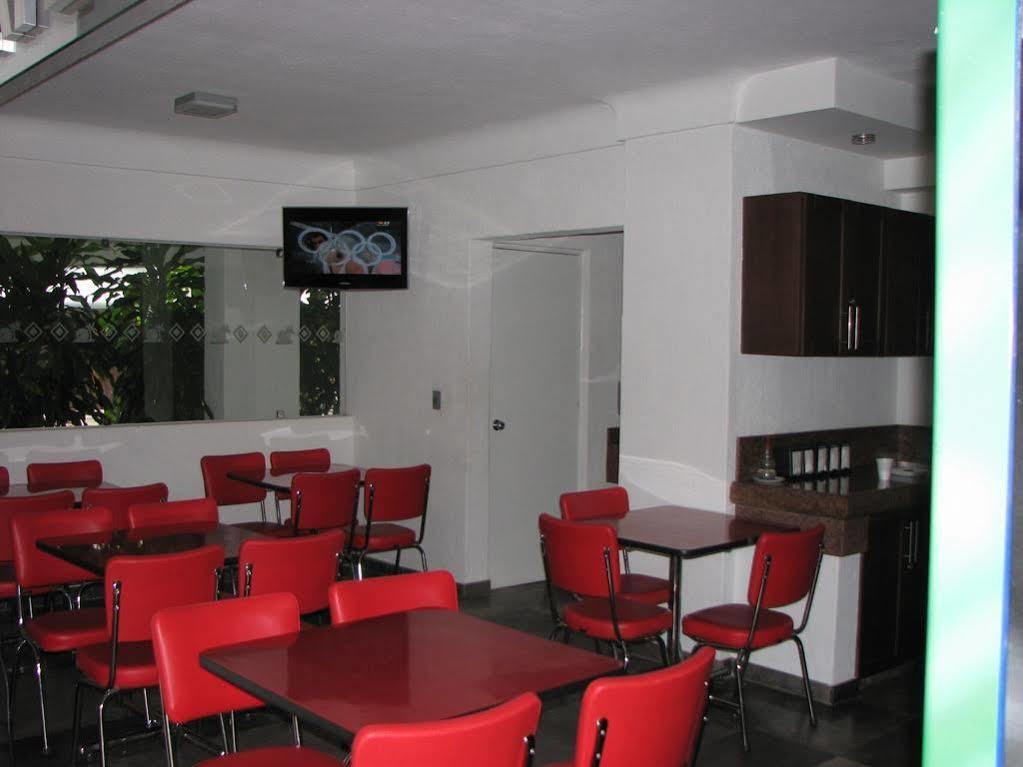 Hotel Y Suites Plaza 曼萨尼约 外观 照片
